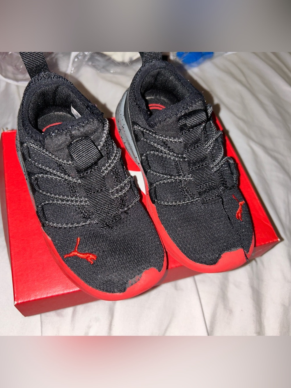 Puma Kids Black Knit Sneakers with Red Accents